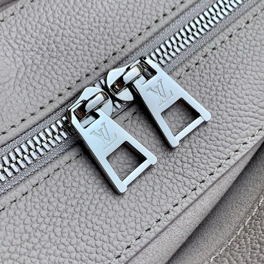 ONTHEGO EAST WEST BAG 25 IN BICOLOR MONOGRAM EMPREINTE LEATHER