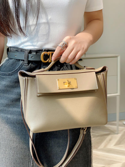 MINI 24/24 21CM IN TOGO ETOUPE EVERCOLOR CALFSKIN GOLD KELLY BUCKLE