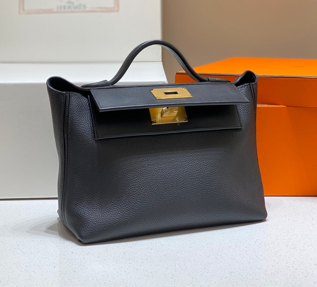 MINI 24/24 29CM IN BLACK EVERCOLOR CALFSKIN GOLD KELLY BUCKLE