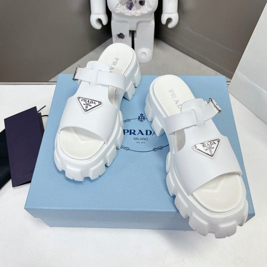MONOLITH SLIPPER SANDALS IN WHITE RUBBER