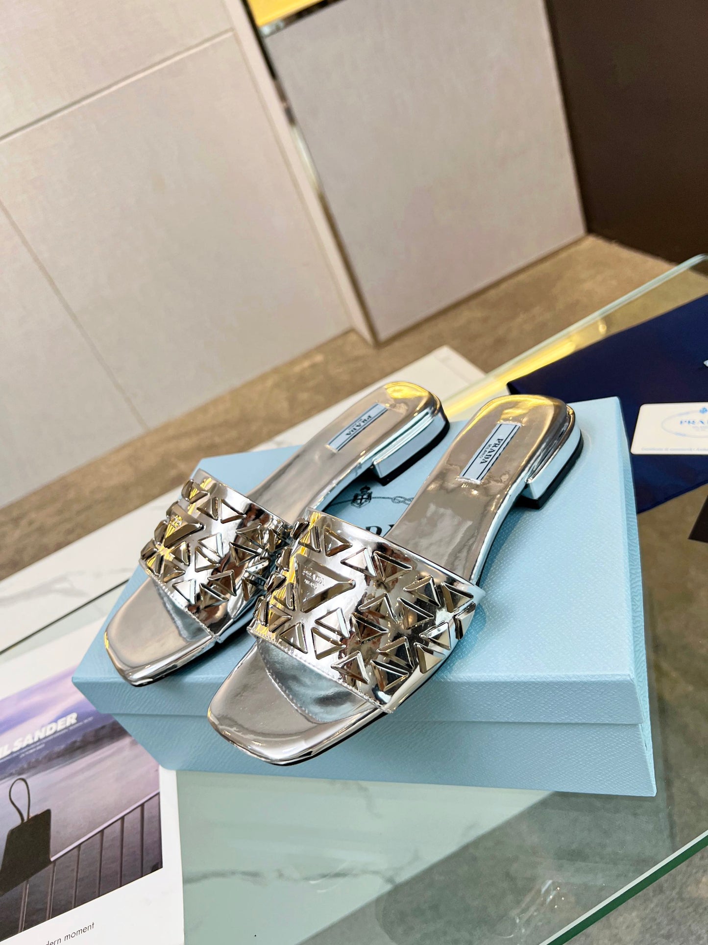 PRA EMBROIDERED SLIDES FLAT SILVER CALFSKIN