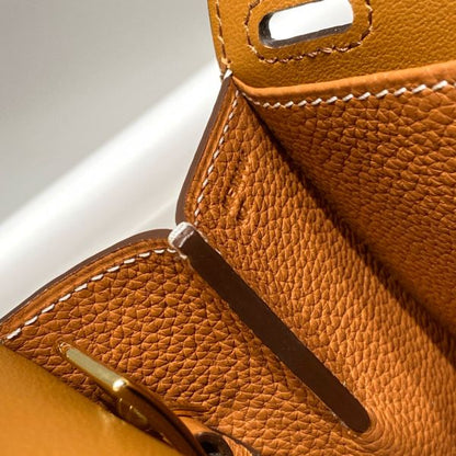 HERM Halzan 25 Bag in Gold Clemence Leather