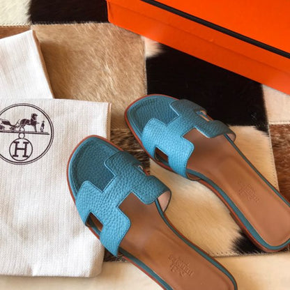 HERM Oran Slide Sandals In Blue Jean Clemence Leather