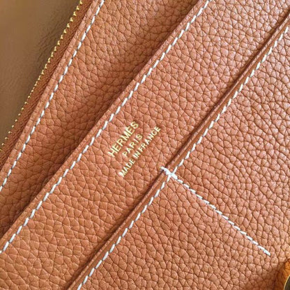 HERM Dogon Duo Wallet In Gold Clemence Leather