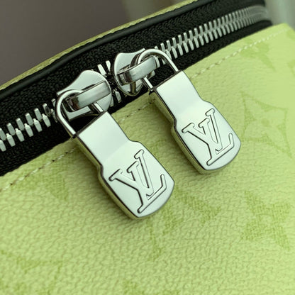 DISCOVERY SLIM BACKPACK 38 IN LEMON YELLOW MONOGRAM ECLIPSE REVERSE CALFSKIN