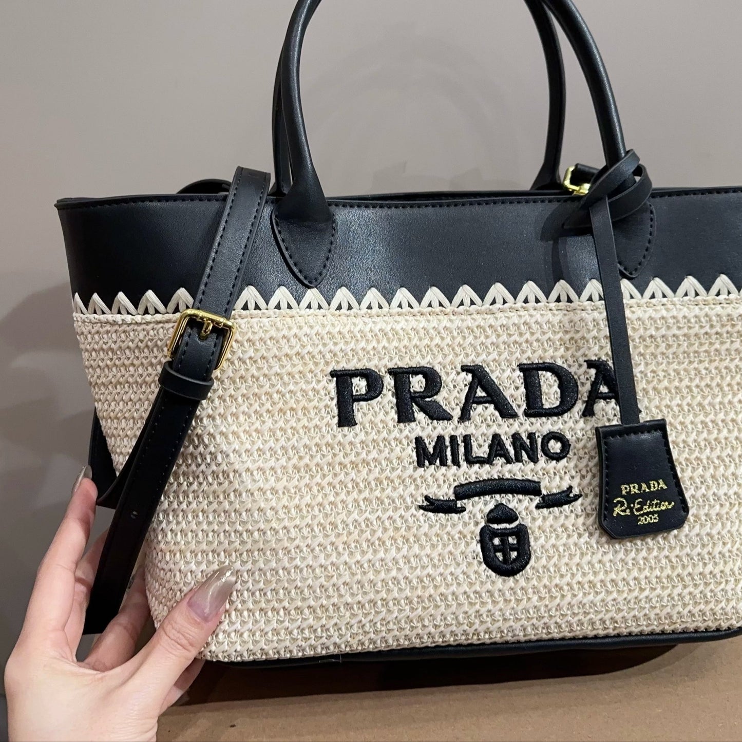 CROCHET TOTE BAG 28 IN BEIGE WOVEN RAFFIA WITH BLACK CALFSKIN STRAP