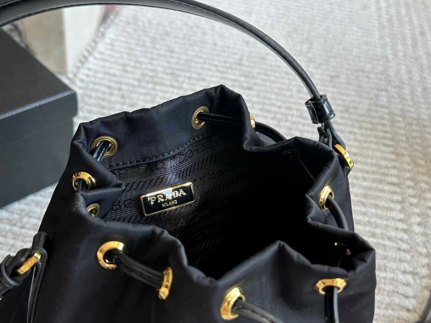 DRAWSTRING HOBO BAG 21 IN BLACK RE-NYLON AND CALFSKIN HANDLE