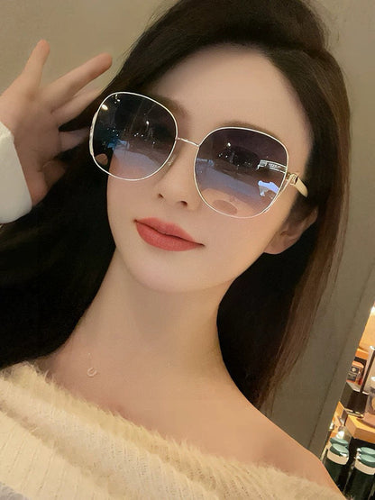 SIGNATURE ROUND SUNGLASSES L8638 IN METAL