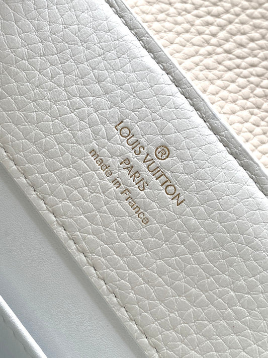 CAPUCINES BB 27 IN WHITE MIX PINK AND BEIGE TAURILLON GOLD HARDWARE
