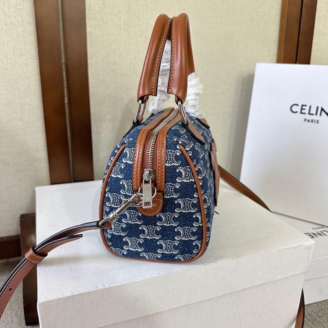 SMALL BOSTON 19 IN SPACE BLUE TRIOMPHE DENIM AND BROWN CALFSKIN TRIM