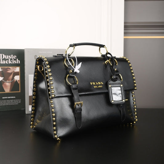 STUDDED BRIEFCASE 34 IN BLACK SHINY SMOOTH CALFSKIN