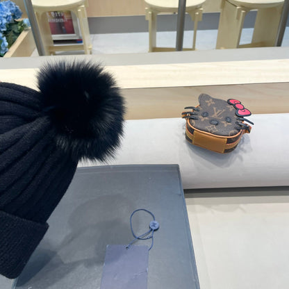 KNITTED BEANIE HAT IN BLACK WOOL AND FOX FUR 409788