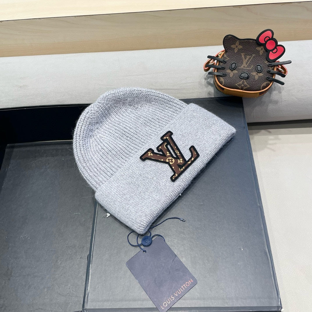KNITTED BEANIE HAT IN GRAY FLEECE AND WOOL 426206