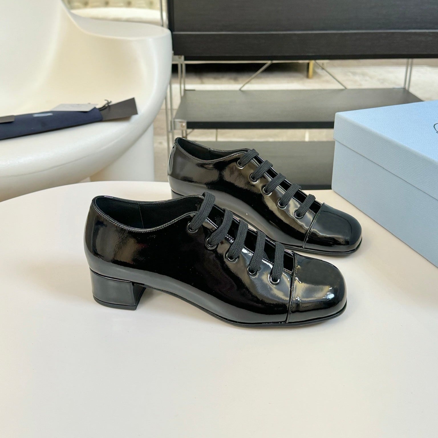 LACE-UP HIGH SHOES IN BLACK GLOSSY CALFSKIN