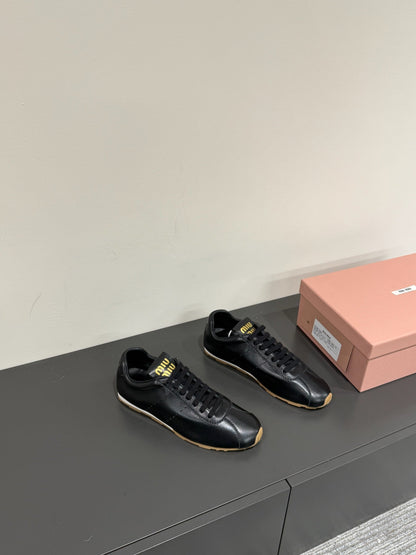 PLUME NAPPA SNEAKERS IN BLACK LAMBSKIN