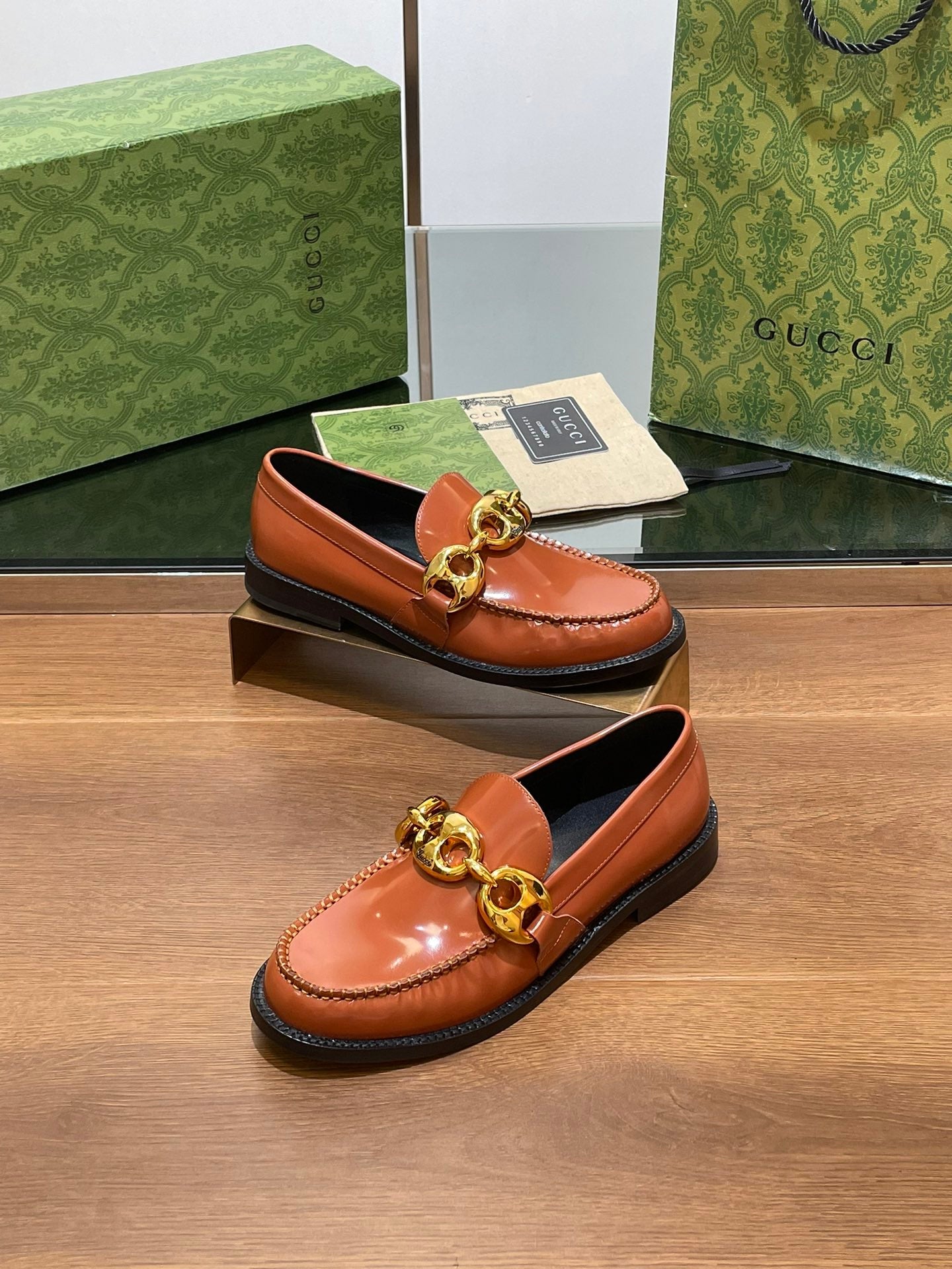 GG LOAFER SHOES IN BRONZE BROWN CALFSKIN WITH GOLD HARDWARE