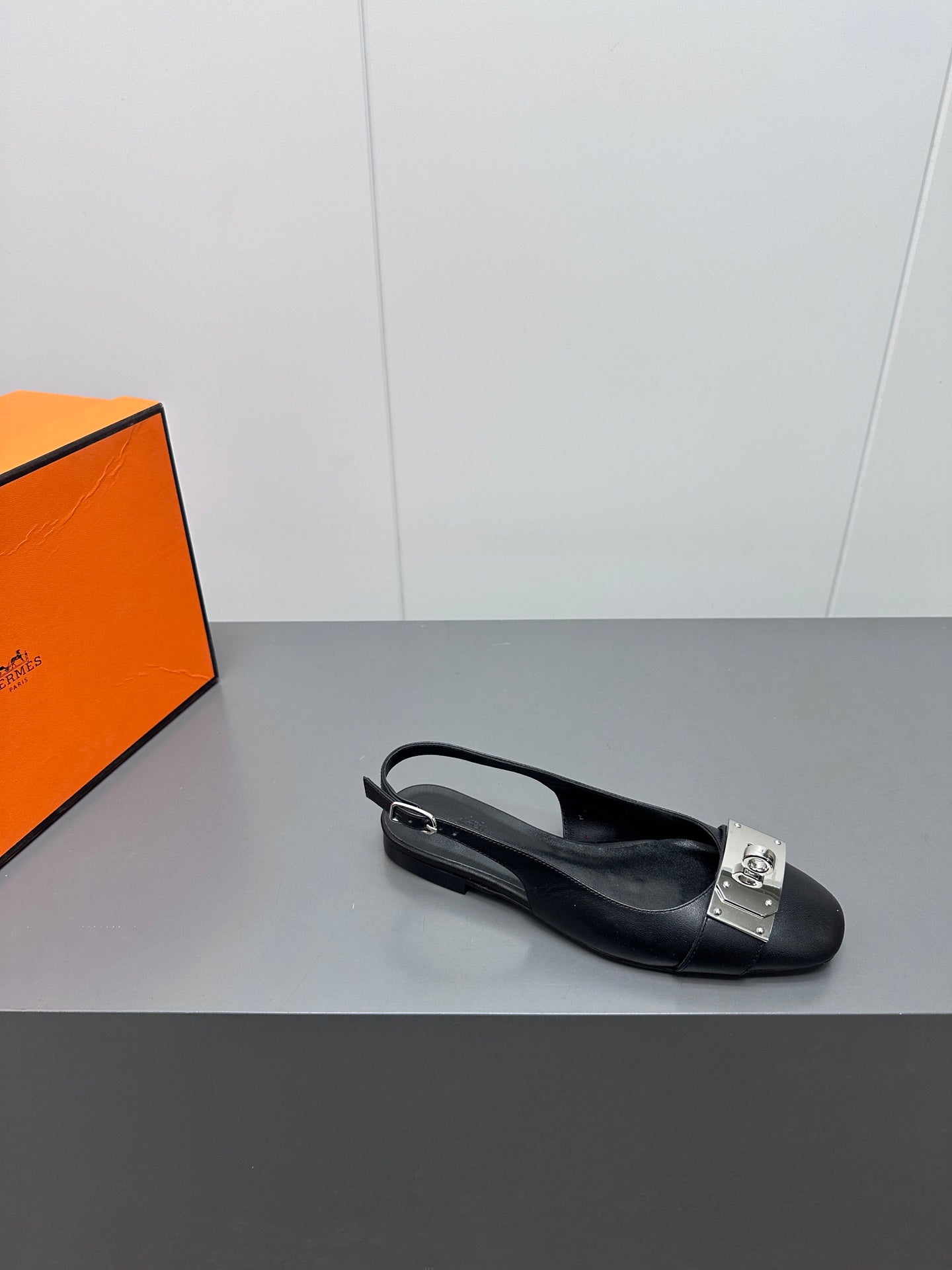 INNOCENTE SLINGBACK IN BLACK CALFSKIN