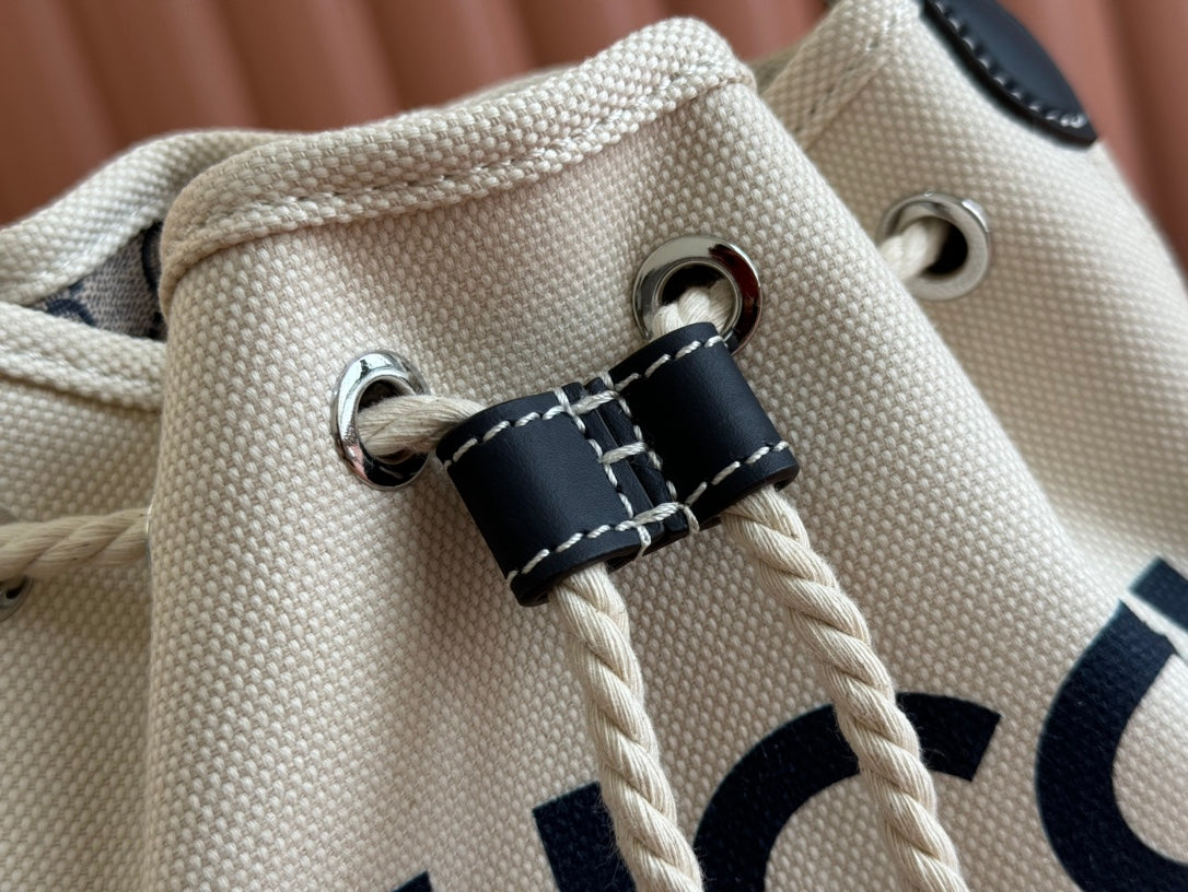 SMALL DRAWSTRING SHOULDER BAG 21 IN WHITE CANVAS DARK BLUE CALFSKIN