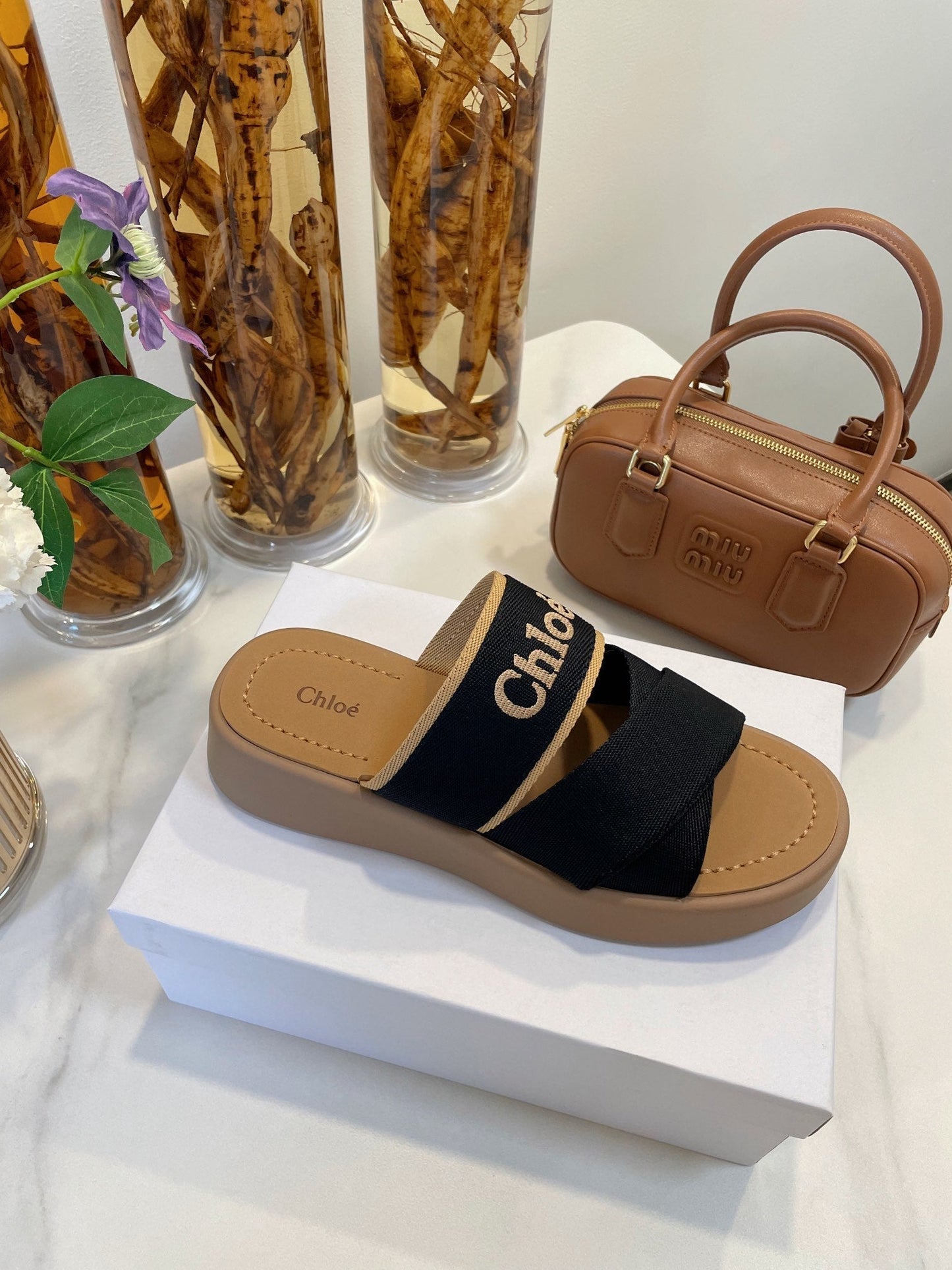 WOODY WEDGE SANDALS IN BLACK CANVAS WITH CIDER BROWN RUBBER SOLE