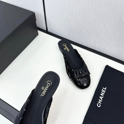 BOW MULE IN BLACK FABRIC AND CALFSKIN