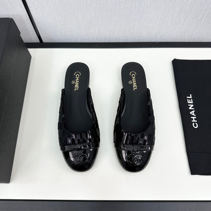 BOW MULE IN BLACK FABRIC AND CALFSKIN