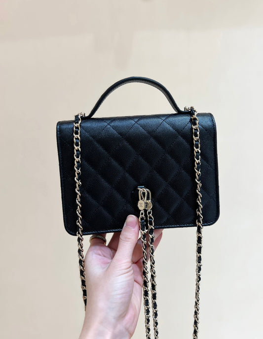 TOP HANDLE FLAP BACKPACK 18 IN BLACK CALFSKIN