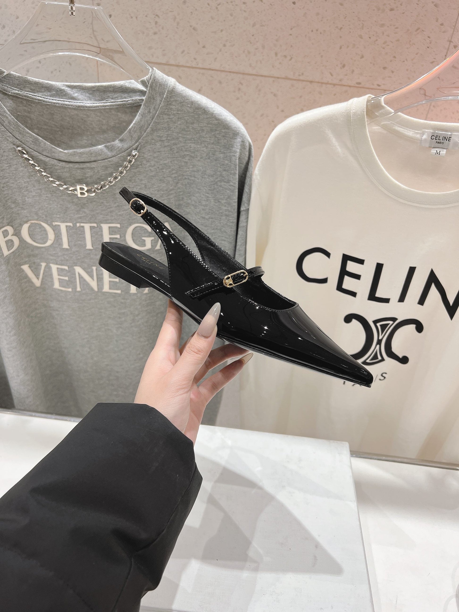 JUDY FLAT SLINGBACK IN BLACK PATENT CALFSKIN